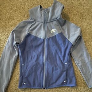 Nike light purple and dark purple zip up hoodie. In good condition! No flaws.